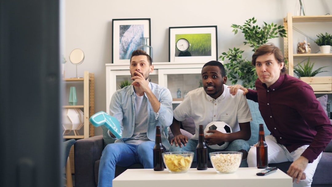 family watching tv commercials